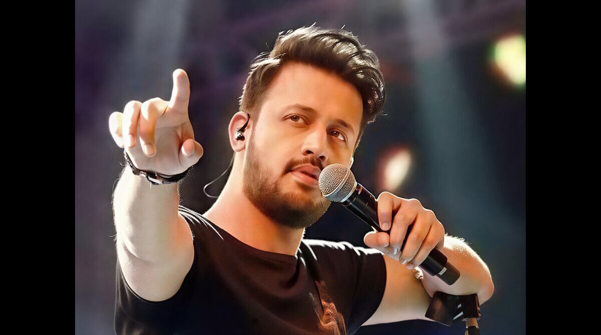 Atif Aslam performing live during a sold-out concert in 2026

