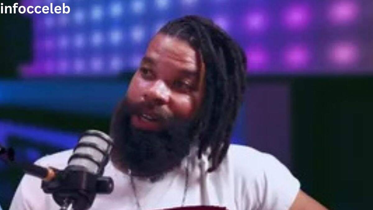 Damon Darling speaking into a microphone during a podcast interview, discussing his career and Damon Darling Net Worth 2026.