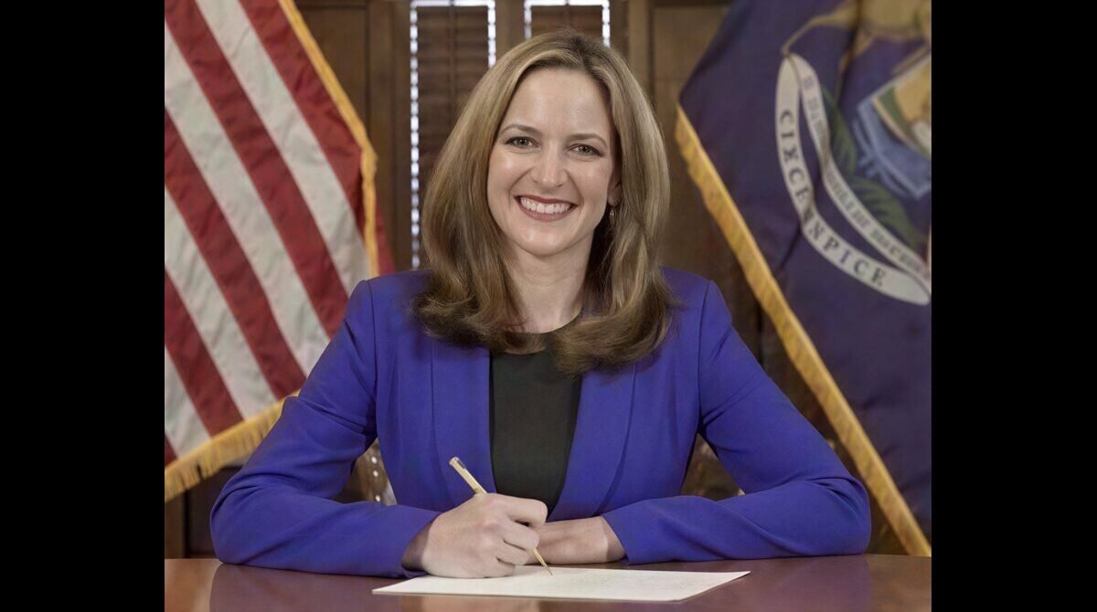 Jocelyn Benson portrait highlighting her estimated net worth and career achievements in 2026.