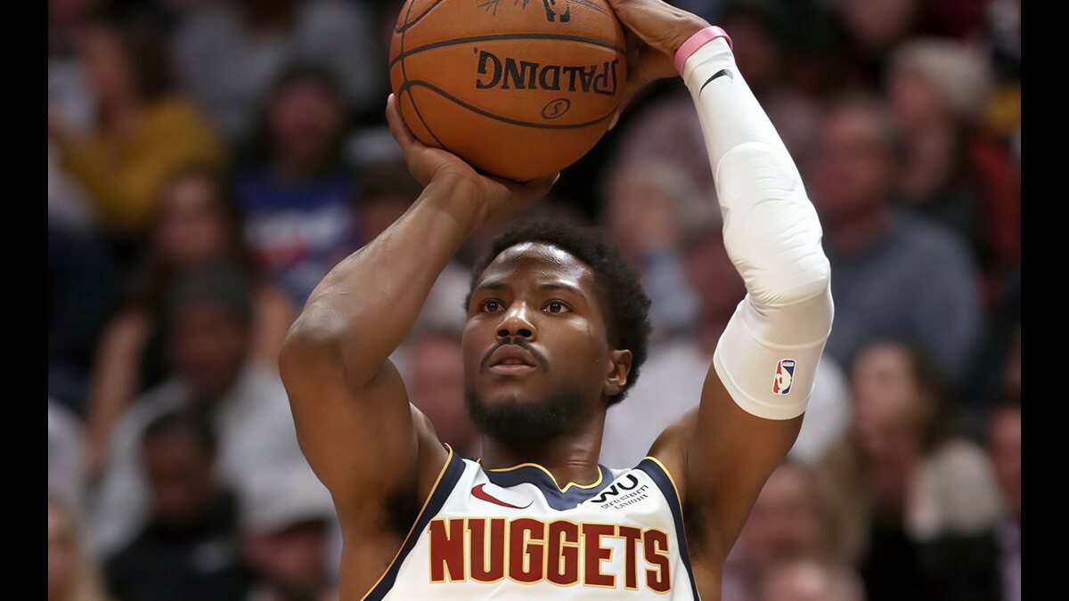 Malik Beasley on the basketball court during his professional NBA career and financial journey in 2026.