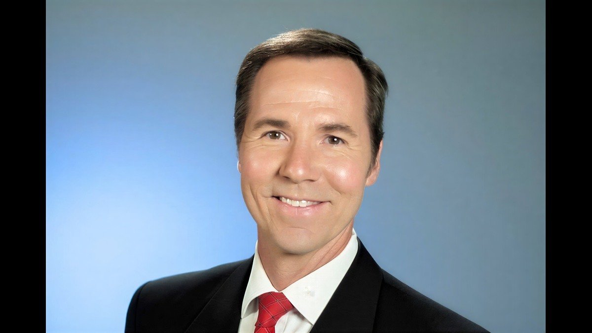 Bill Randby smiling in the KETV weather studio for a Bill Randby Net Worth 2026 profile.